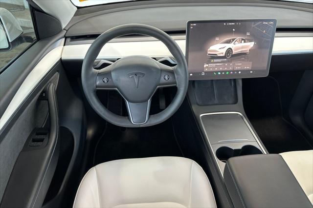 used 2023 Tesla Model Y car, priced at $29,500