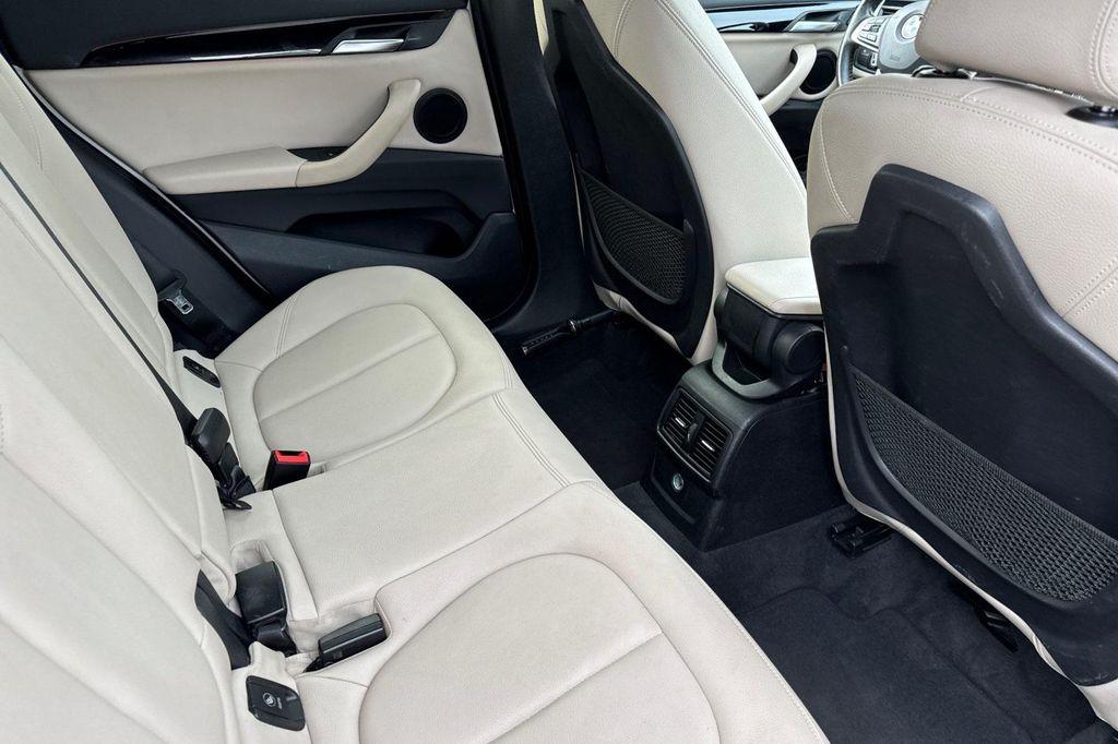 used 2018 BMW X1 car, priced at $17,800