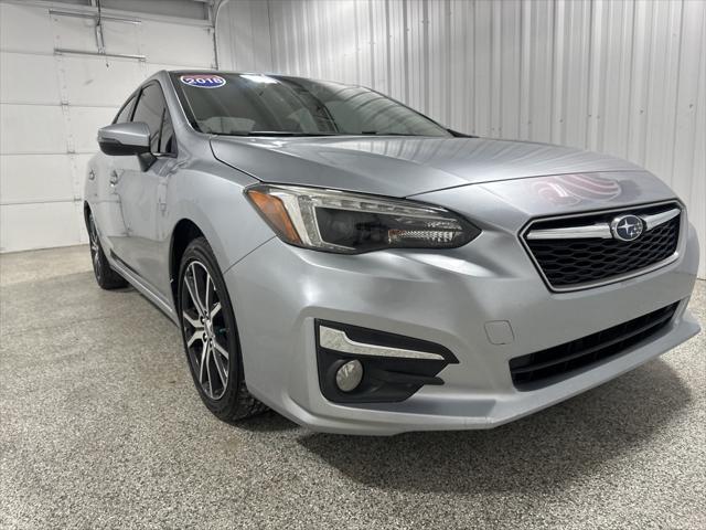 used 2018 Subaru Impreza car, priced at $14,490