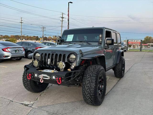 used 2014 Jeep Wrangler Unlimited car, priced at $20,990