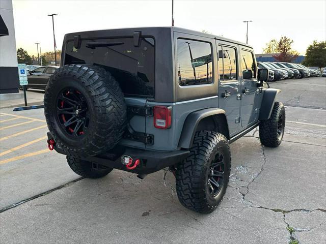 used 2014 Jeep Wrangler Unlimited car, priced at $20,990