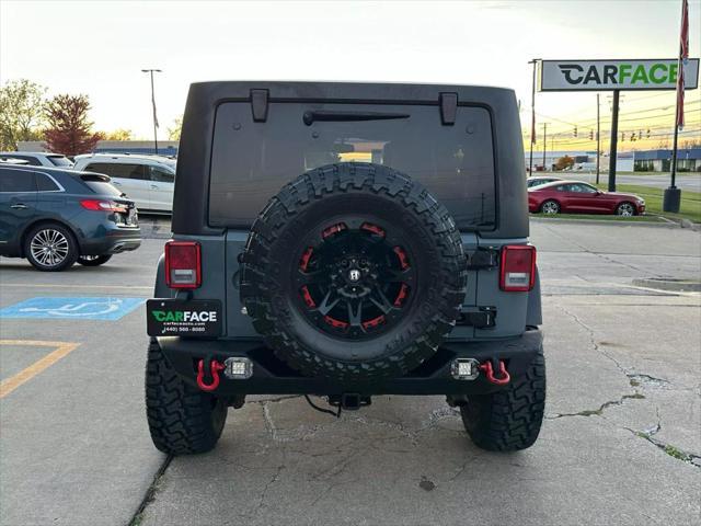 used 2014 Jeep Wrangler Unlimited car, priced at $20,990