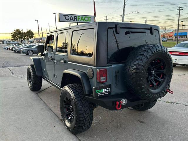 used 2014 Jeep Wrangler Unlimited car, priced at $20,990