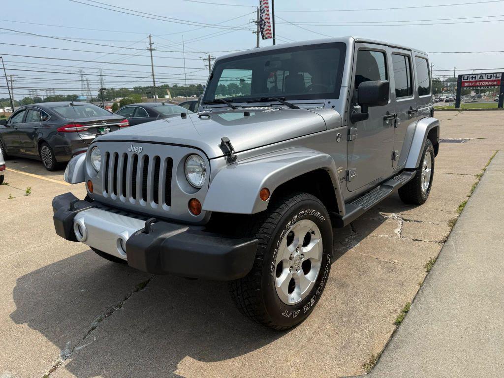 used 2013 Jeep Wrangler Unlimited car, priced at $16,750
