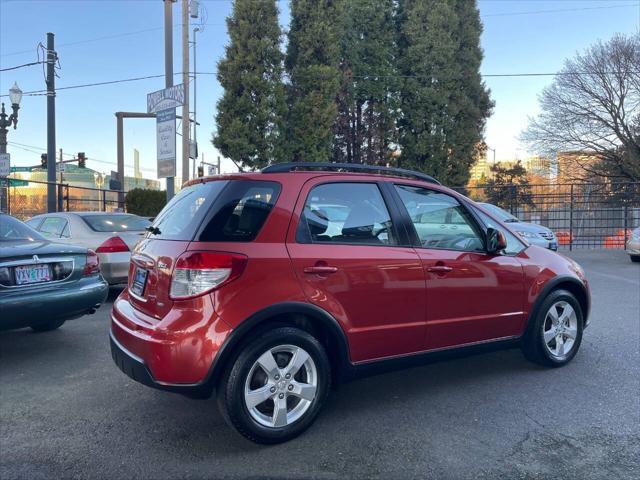 used 2012 Suzuki SX4 car, priced at $8,999