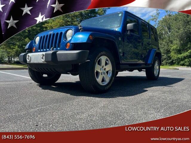 used 2009 Jeep Wrangler Unlimited car, priced at $13,990