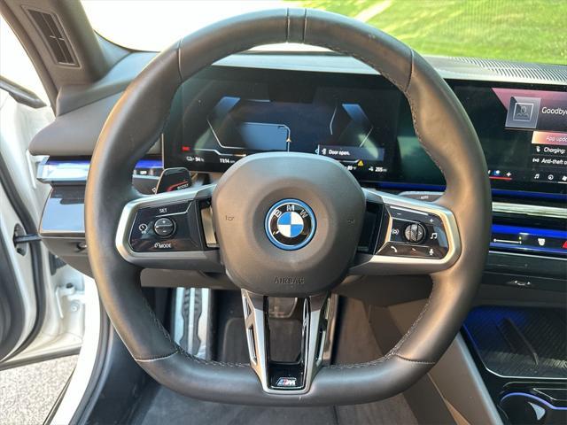 used 2024 BMW i5 car, priced at $53,988