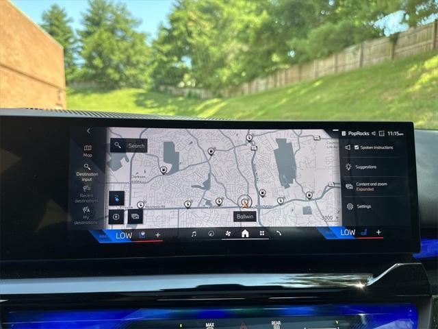 used 2024 BMW i5 car, priced at $53,988