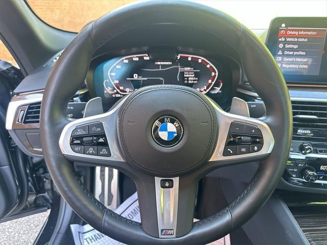 used 2023 BMW M550 car, priced at $67,595
