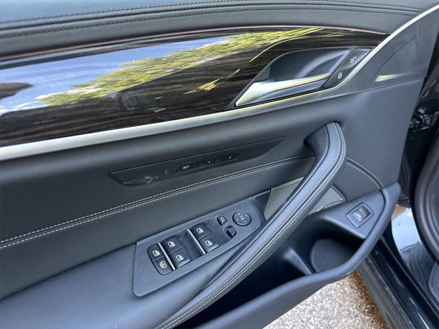 used 2023 BMW M550 car, priced at $67,595