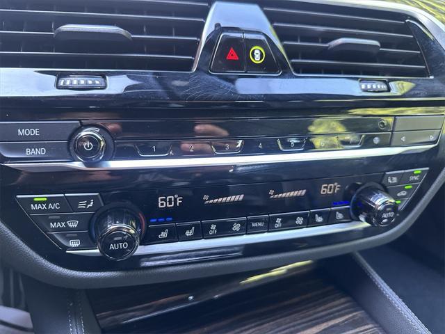 used 2023 BMW M550 car, priced at $67,595