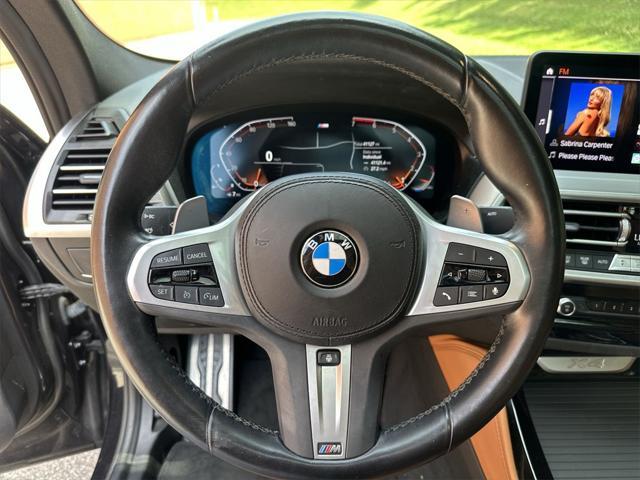 used 2023 BMW X4 car, priced at $44,223