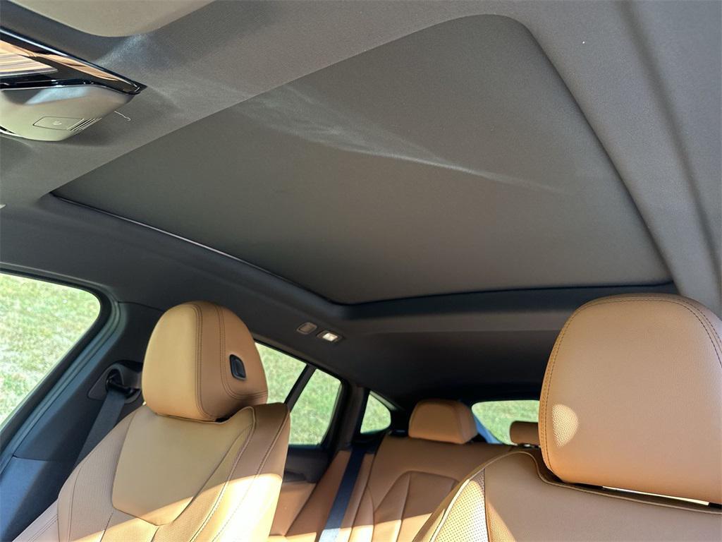 new 2025 BMW X4 car, priced at $63,985