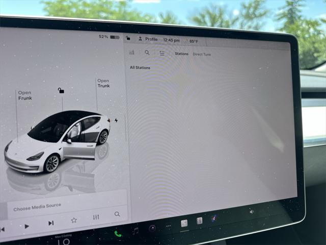 used 2023 Tesla Model 3 car, priced at $28,353