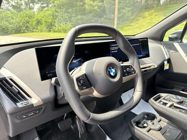 new 2026 BMW iX car, priced at $87,325