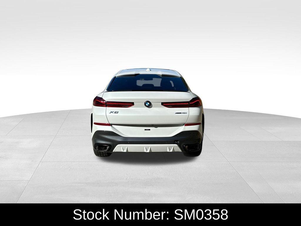 new 2026 BMW X6 car, priced at $90,490
