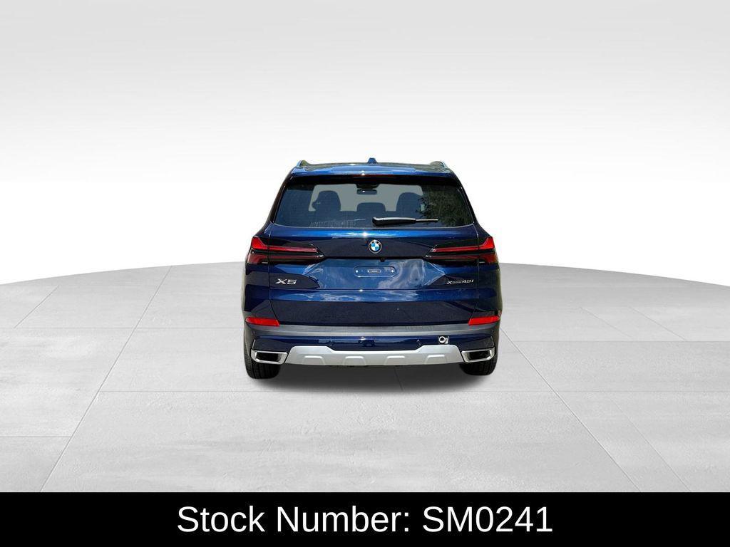 new 2026 BMW X5 car, priced at $77,850
