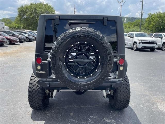 used 2014 Jeep Wrangler Unlimited car, priced at $16,700