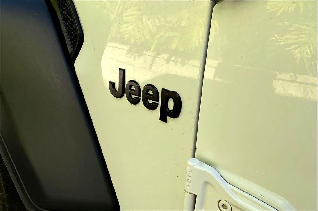 used 2023 Jeep Wrangler car, priced at $30,393