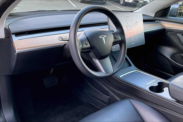 used 2023 Tesla Model 3 car, priced at $27,411