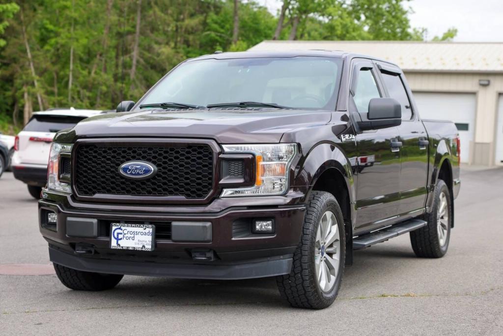 used 2018 Ford F-150 car, priced at $27,097
