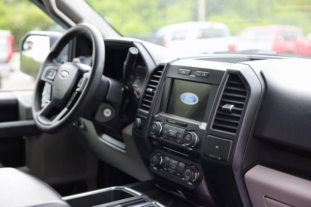 used 2018 Ford F-150 car, priced at $27,097