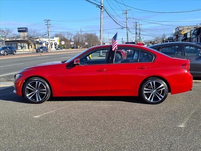 used 2018 BMW 330 car, priced at $19,614