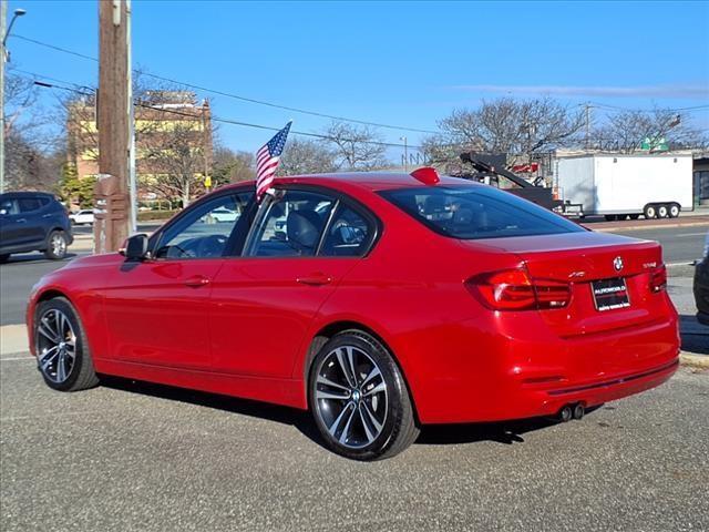 used 2018 BMW 330 car, priced at $19,614