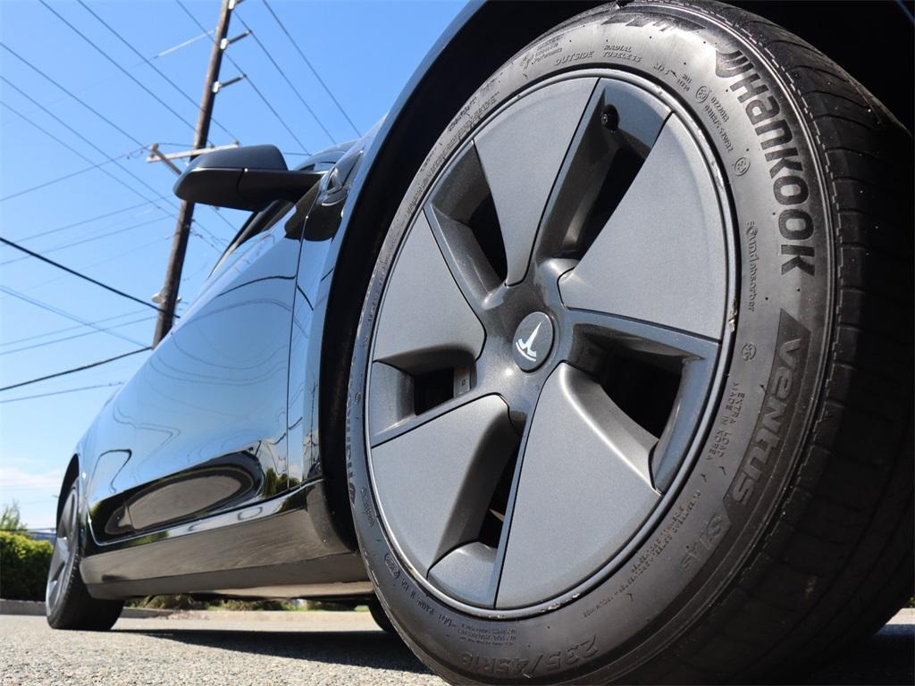 used 2023 Tesla Model 3 car, priced at $23,875
