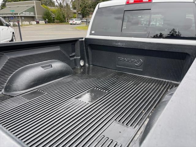 used 2019 Ram 1500 car, priced at $21,341