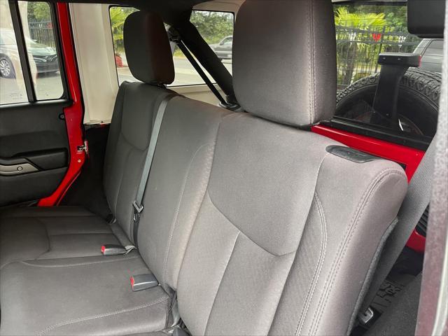 used 2015 Jeep Wrangler Unlimited car, priced at $17,549