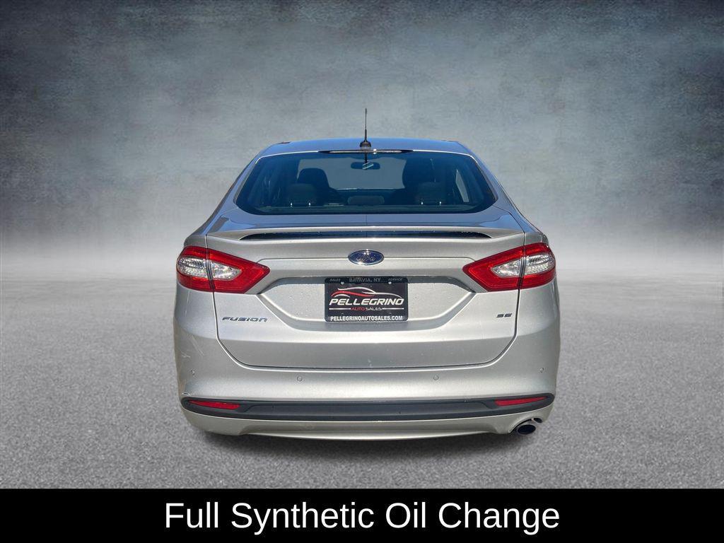 used 2016 Ford Fusion car, priced at $12,000