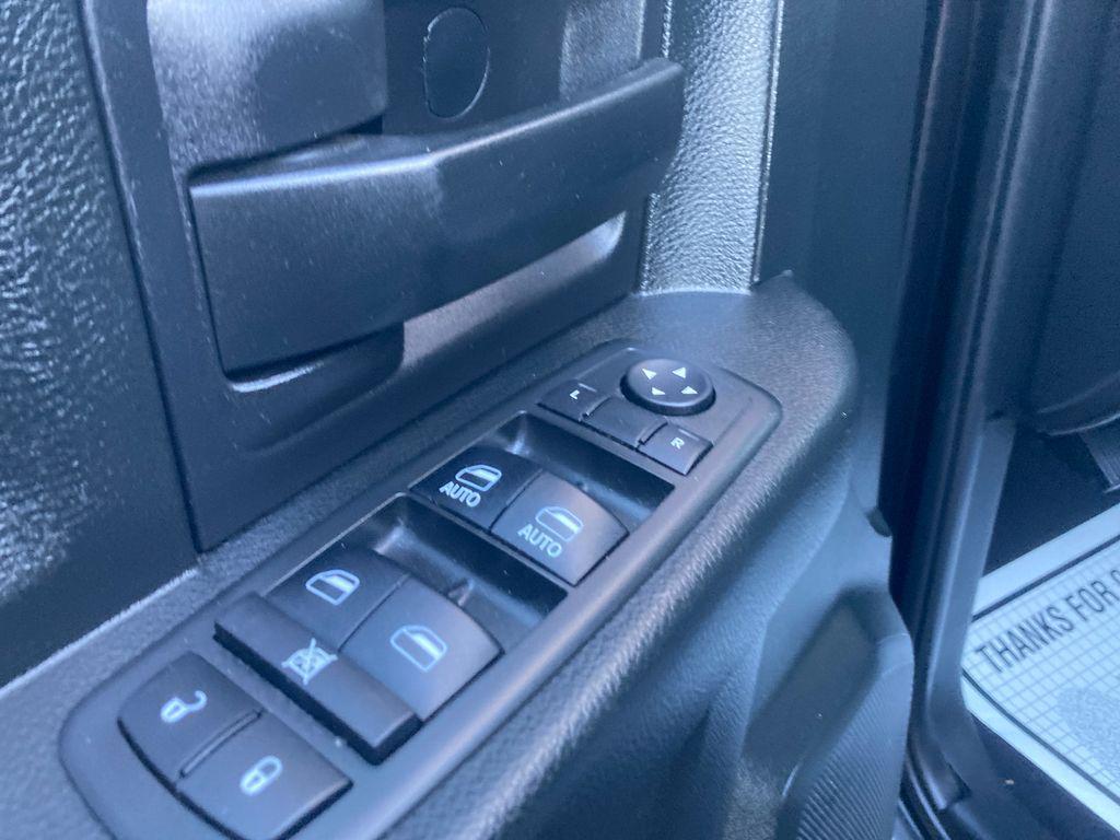 used 2018 Ram 1500 car, priced at $23,000