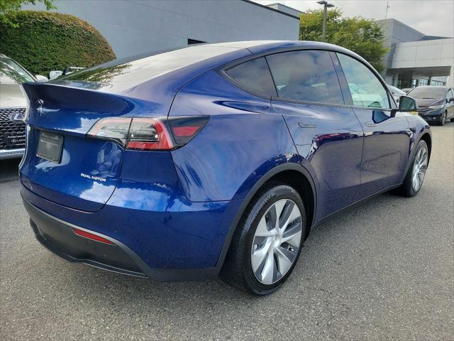 used 2022 Tesla Model Y car, priced at $31,995