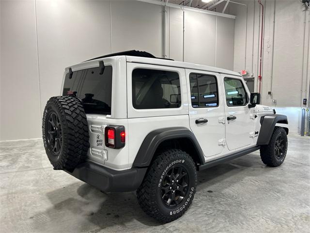 used 2021 Jeep Wrangler Unlimited car, priced at $34,250