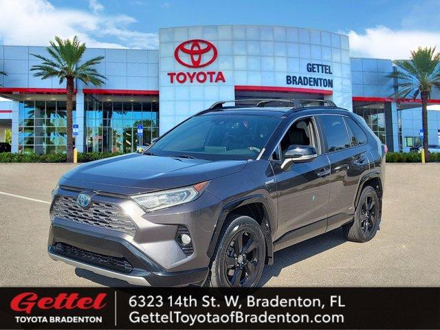 used 2019 Toyota RAV4 Hybrid car, priced at $26,371