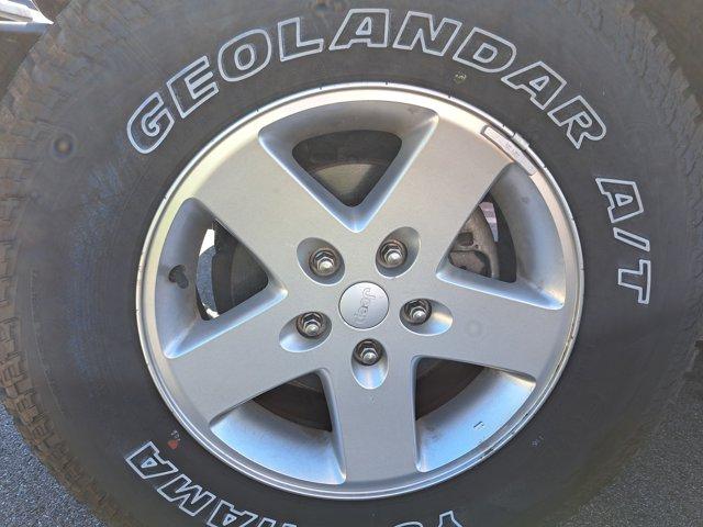 used 2014 Jeep Wrangler Unlimited car, priced at $10,988