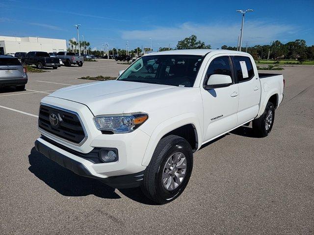 used 2019 Toyota Tacoma car, priced at $27,496