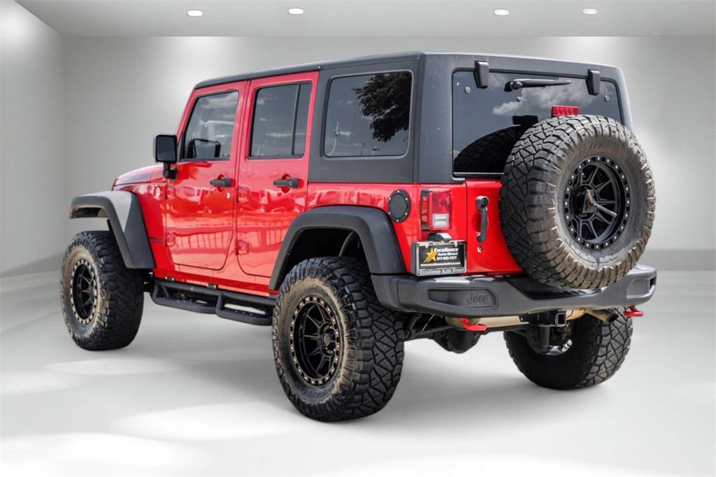 used 2014 Jeep Wrangler Unlimited car, priced at $15,981