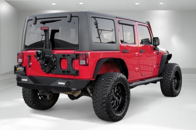 used 2018 Jeep Wrangler JK Unlimited car, priced at $19,881