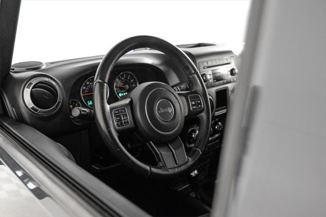 used 2016 Jeep Wrangler Unlimited car, priced at $17,381