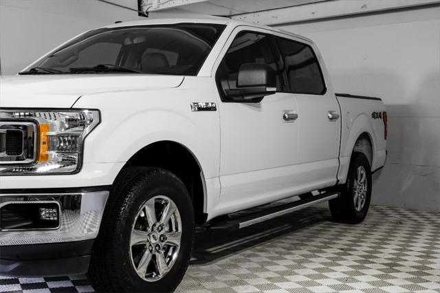 used 2018 Ford F-150 car, priced at $22,281