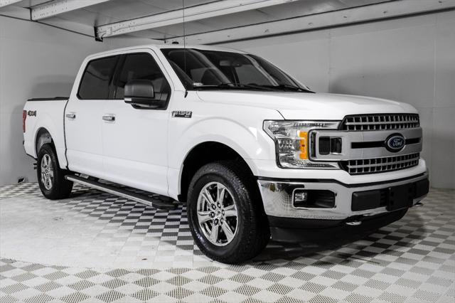 used 2018 Ford F-150 car, priced at $22,281