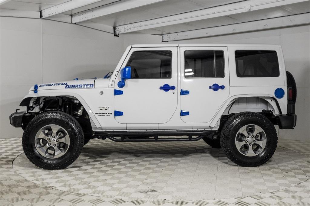 used 2016 Jeep Wrangler Unlimited car, priced at $18,681