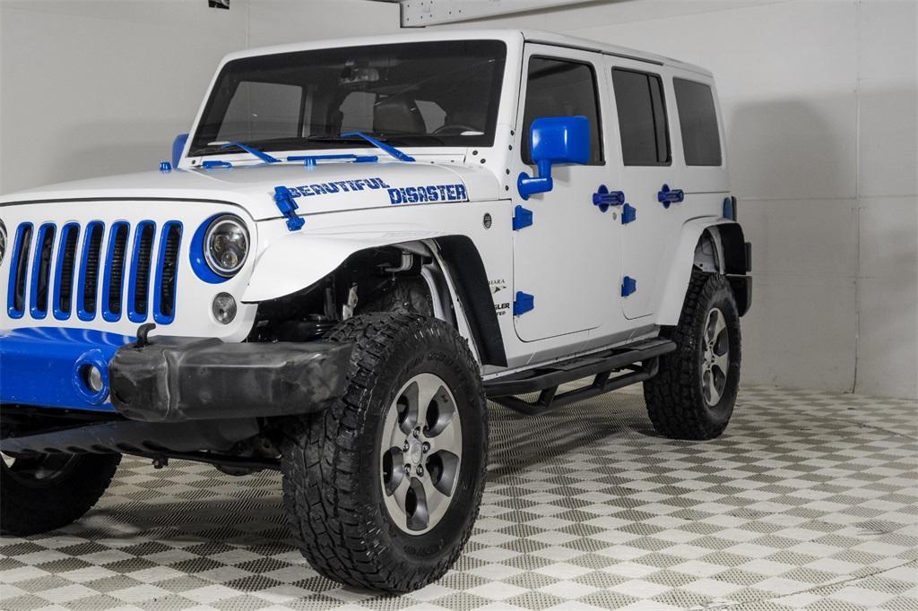 used 2016 Jeep Wrangler Unlimited car, priced at $18,681