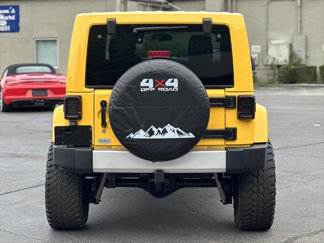 used 2015 Jeep Wrangler Unlimited car, priced at $23,698