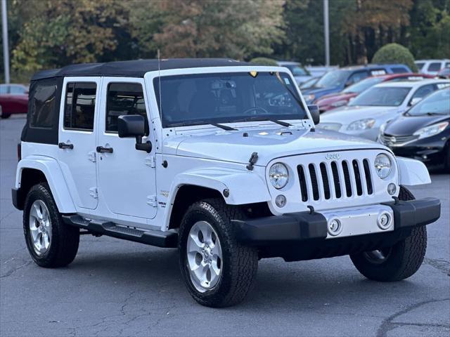 used 2014 Jeep Wrangler Unlimited car, priced at $14,988