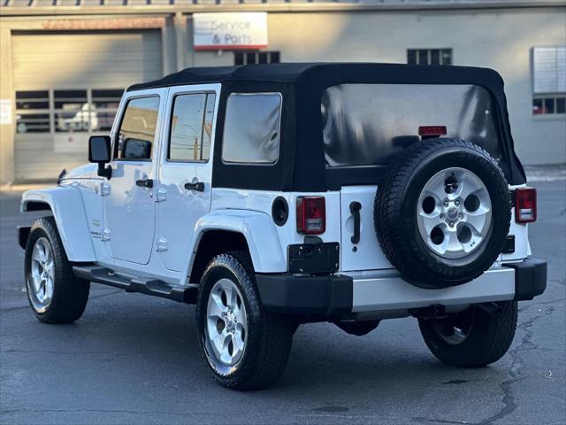 used 2014 Jeep Wrangler Unlimited car, priced at $14,498