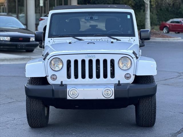 used 2014 Jeep Wrangler Unlimited car, priced at $14,988