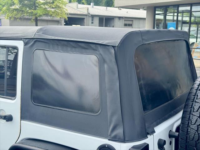 used 2017 Jeep Wrangler Unlimited car, priced at $20,498